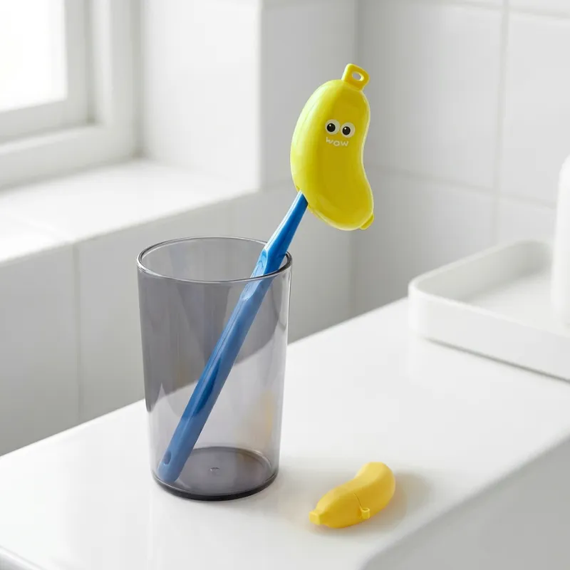 Bananformet tandbørste- og tandpasta-rejseetui til børn